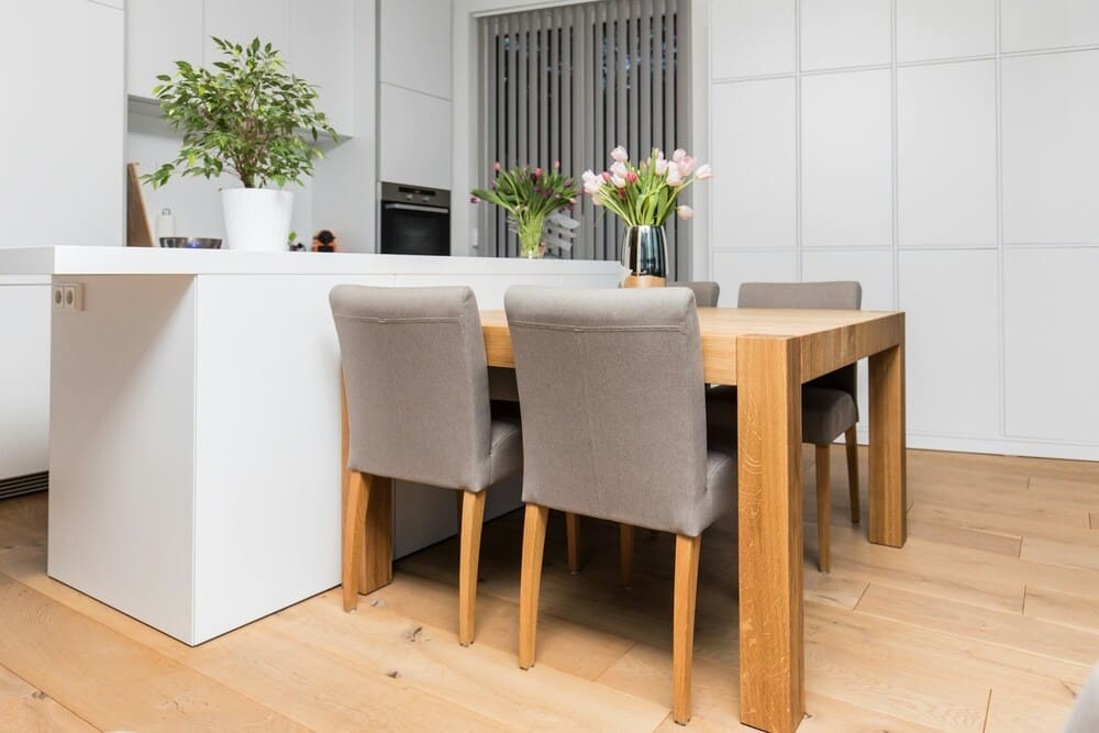 multifunctional kitchen with dining table attached to the counter